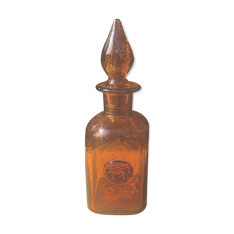 Old carafe in amber and bulled Biot glass, stamp 1496.