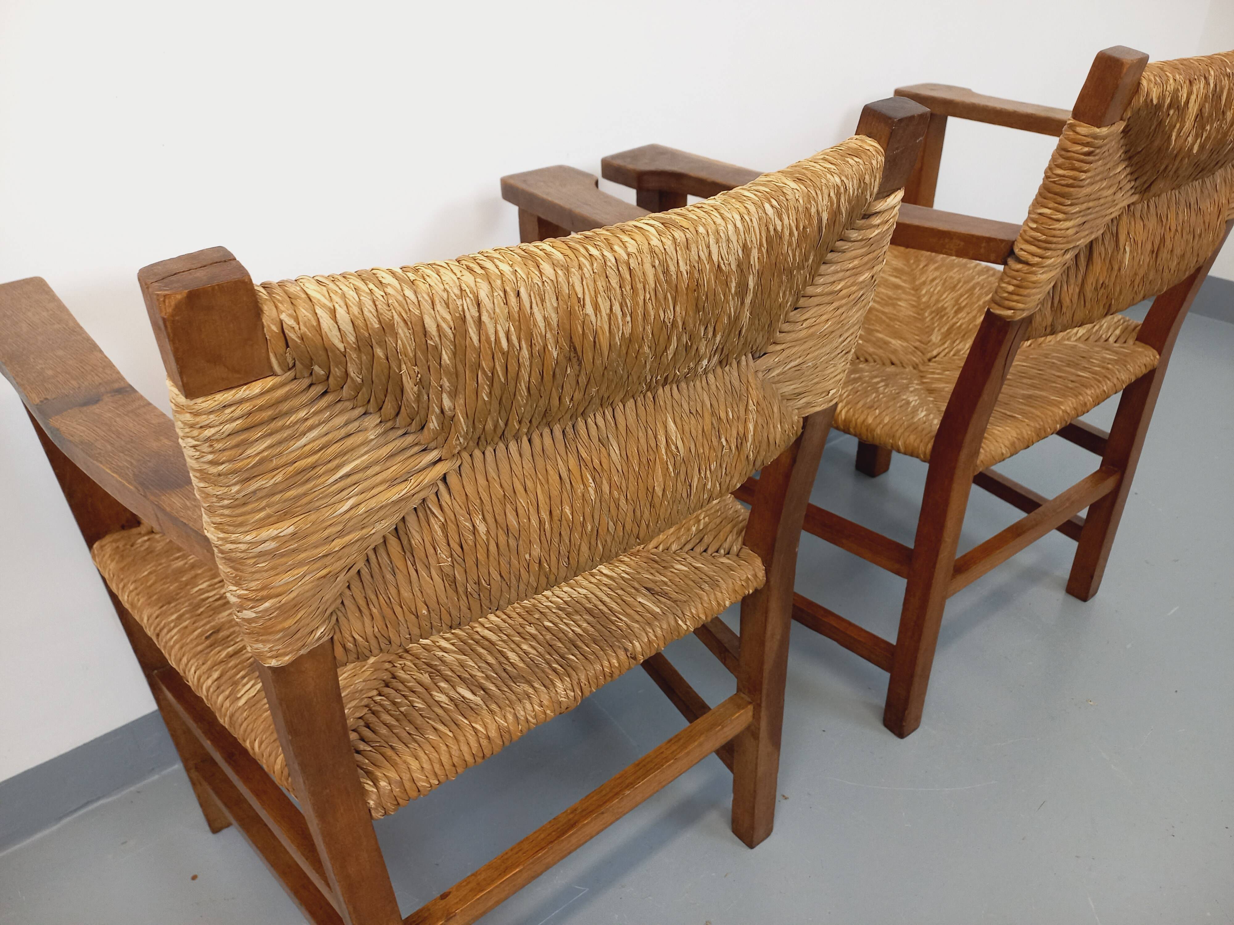 Set of 2 vintage brutalist armchairs in oak wood and straw