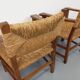 Suite de 2 fauteuils brutalistes vintage en bois de chêne et paille