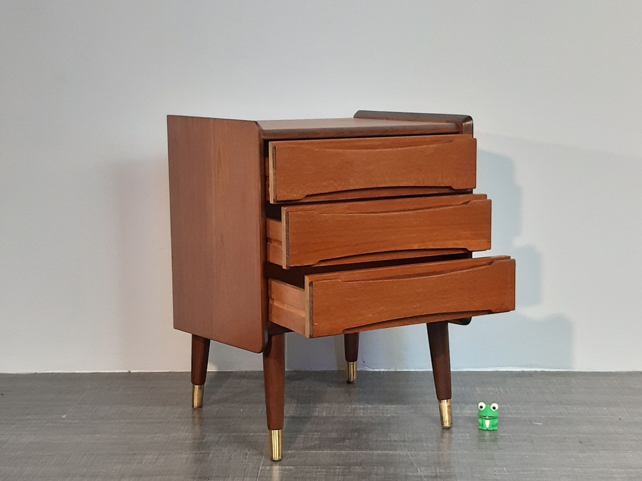 Norwegian bedside table with 3 drawers, teak and brass clogs