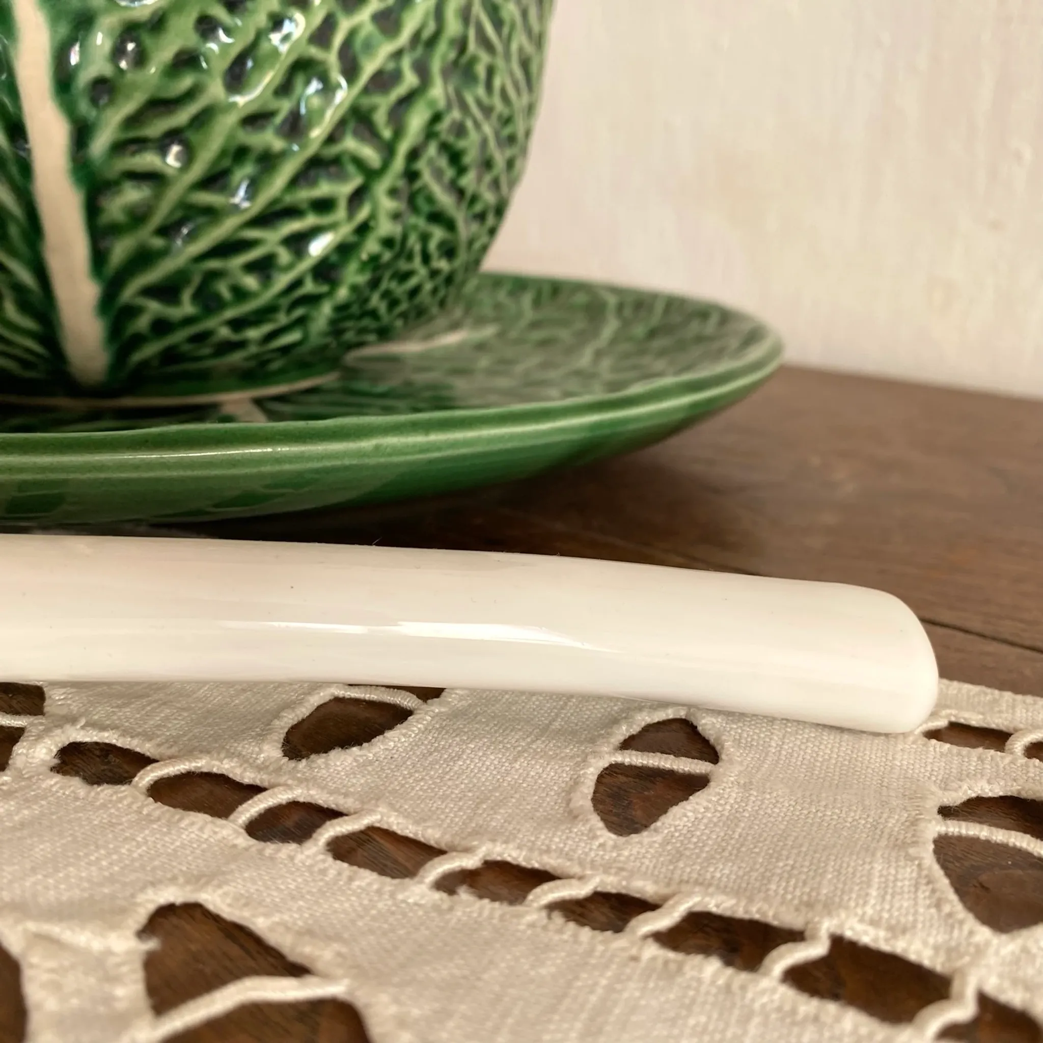 Large soup tureen in earthenware with a cabbage design, along with a dish and spoon.