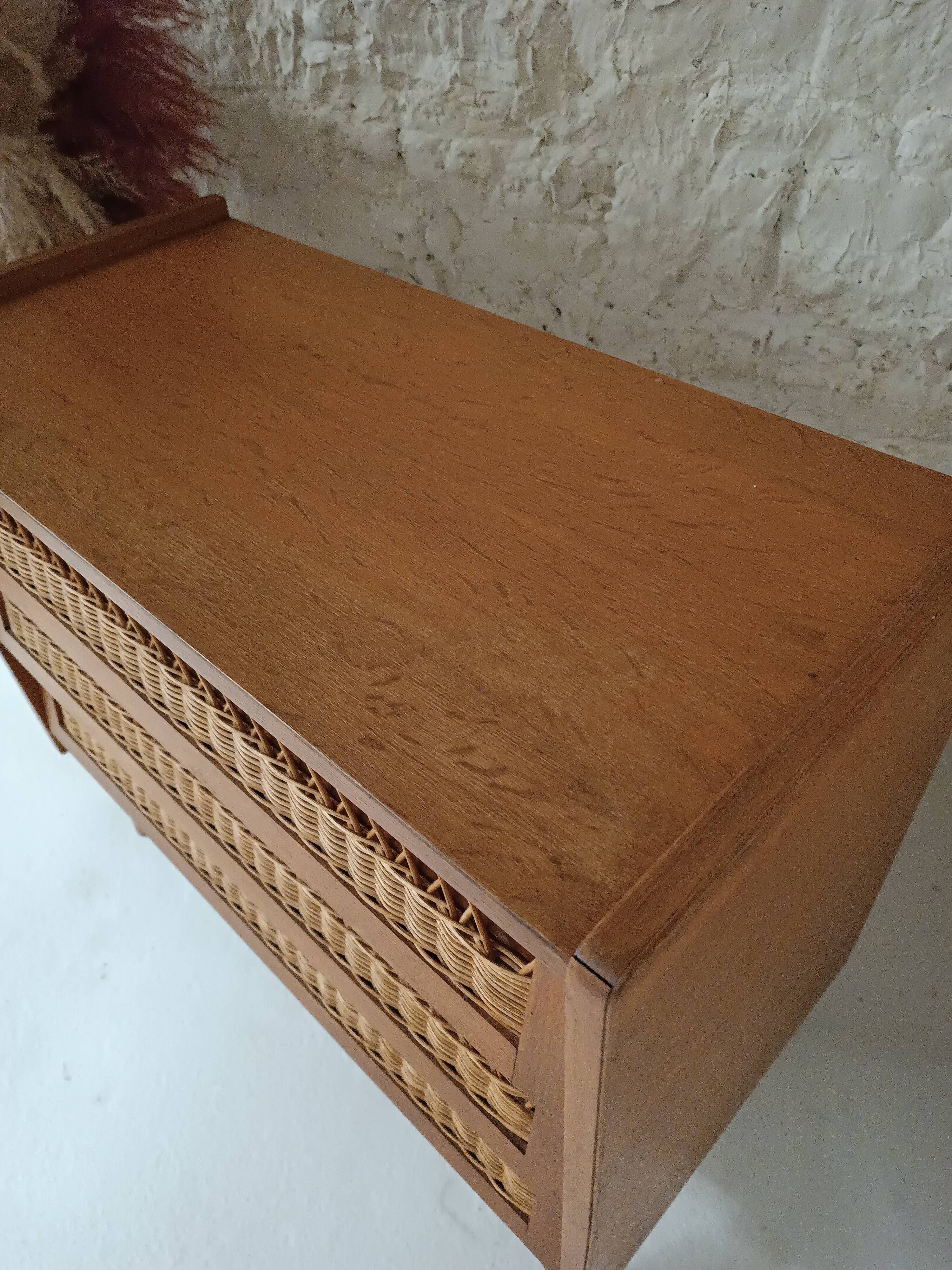Vintage wooden and rattan chest of drawers in the 60s