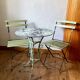 Ensemble bistrot ancien en fer forgé, table années 30 et chaises pliantes