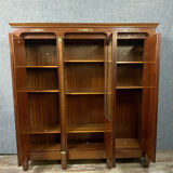 Empire library in varnished mahogany around 1950