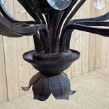 Large pineapple chandelier in blackened metal and tassels