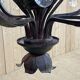 Large pineapple chandelier in blackened metal and tassels