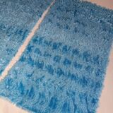 Set of two vintage sky blue rugs from the 70s