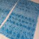 Set of two vintage sky blue rugs from the 70s