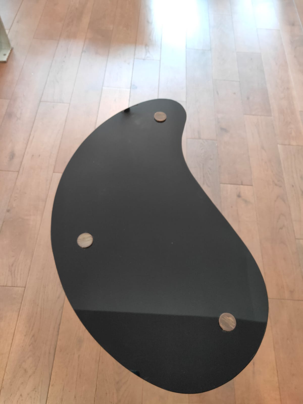 Black glass tripod table 1950