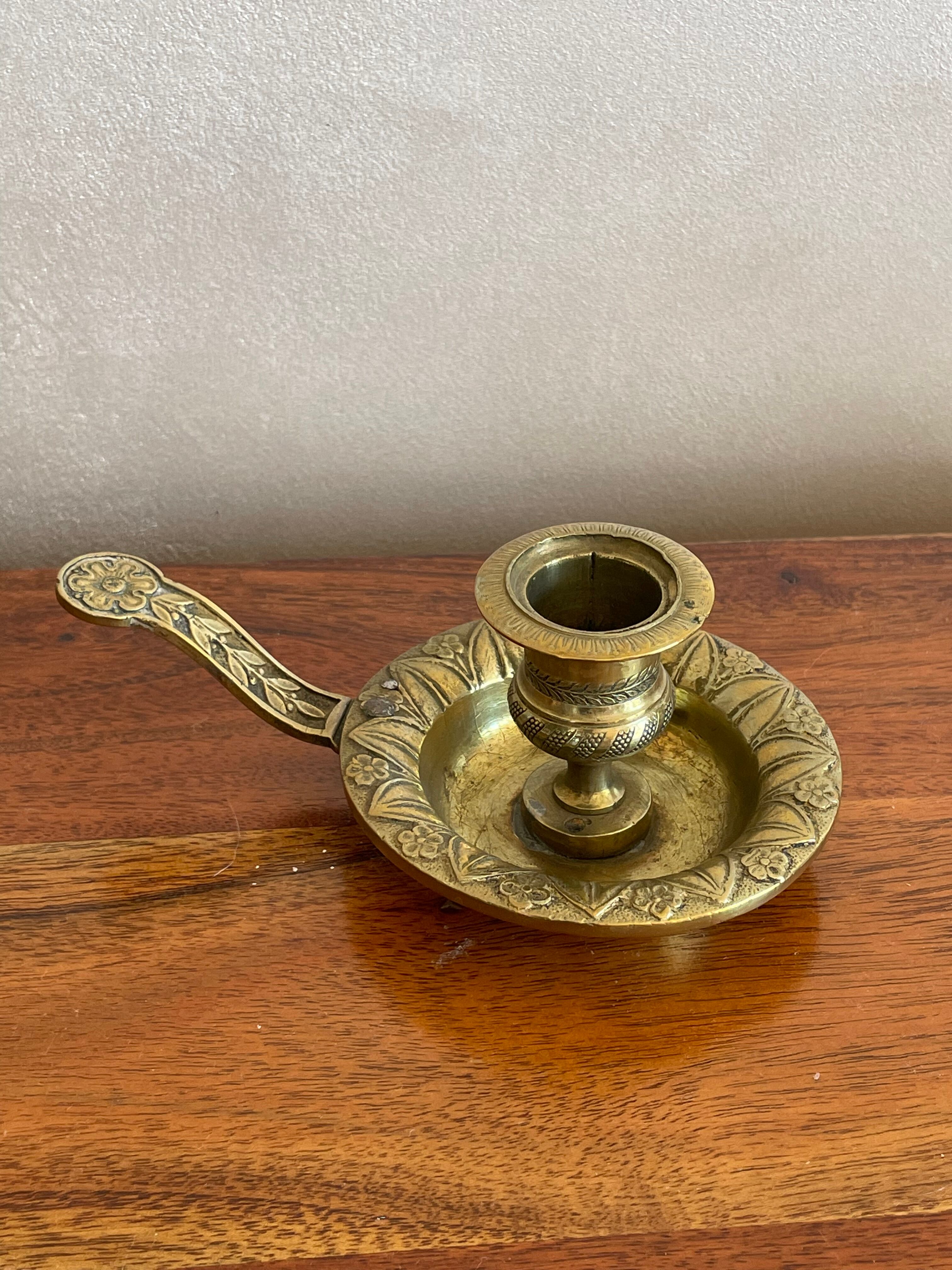 Brass hand candlestick