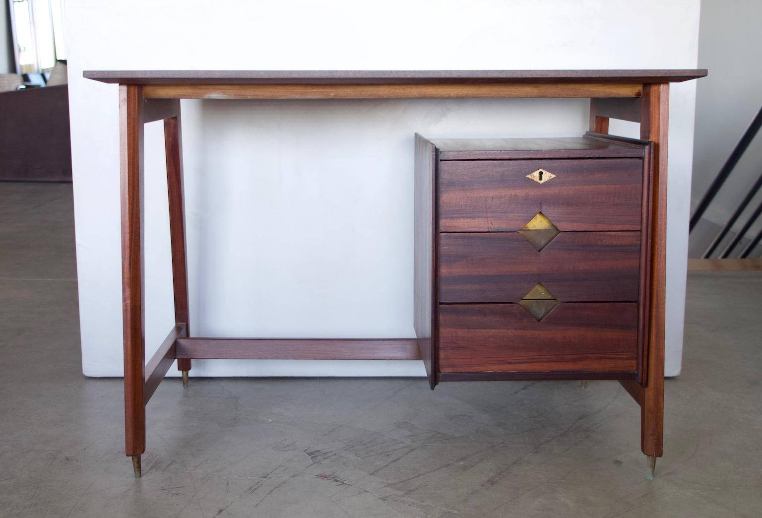 Small Italian wooden desk with brass details.