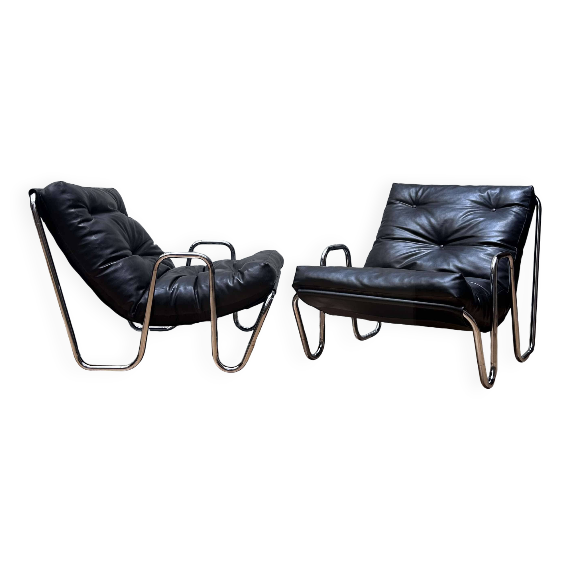 Pair of vintage armchairs in black imitation leather and chrome metal, France 1970
