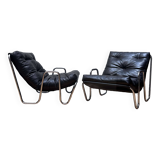 Pair of vintage armchairs in black imitation leather and chrome metal, France 1970