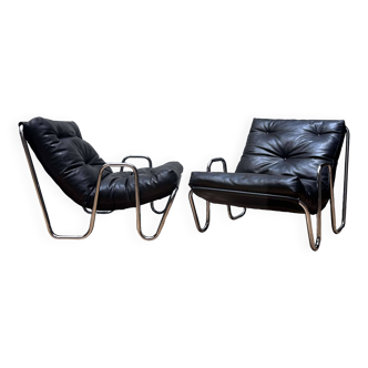 Pair of vintage armchairs in black imitation leather and chrome metal, France 1970