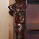 Hand-carved library circa 1900 in hardwood with Hermes statues.
