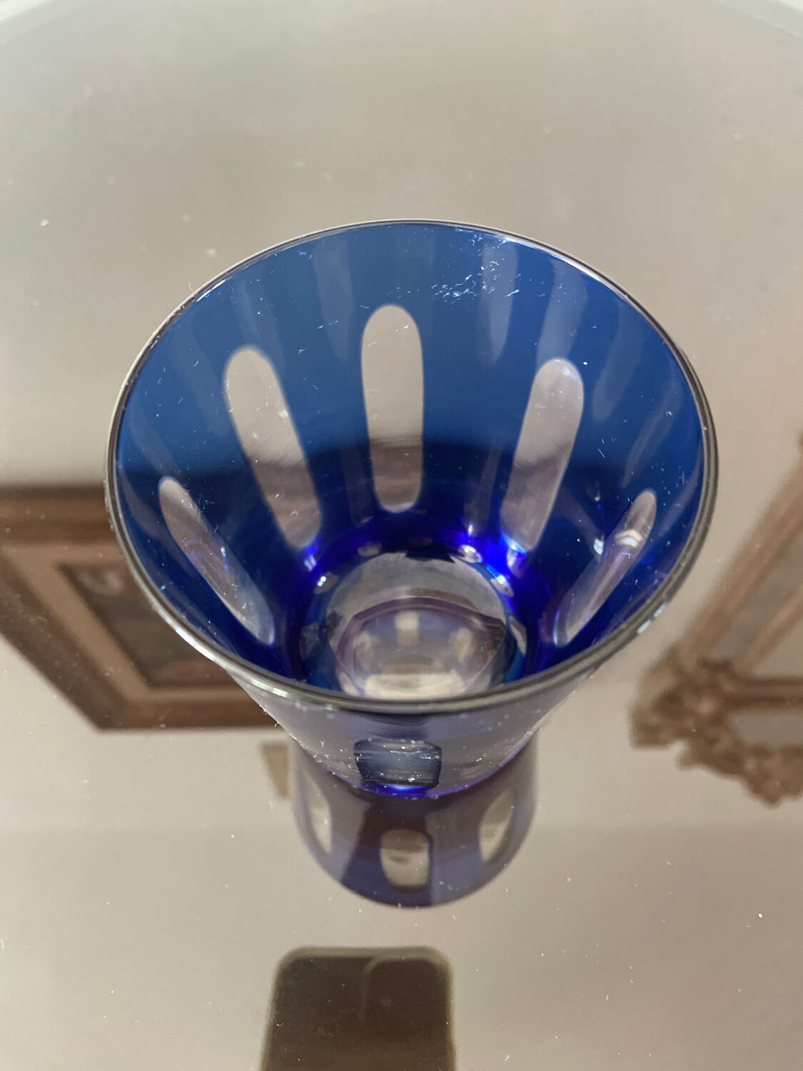 Antique crystal glass lined blue.