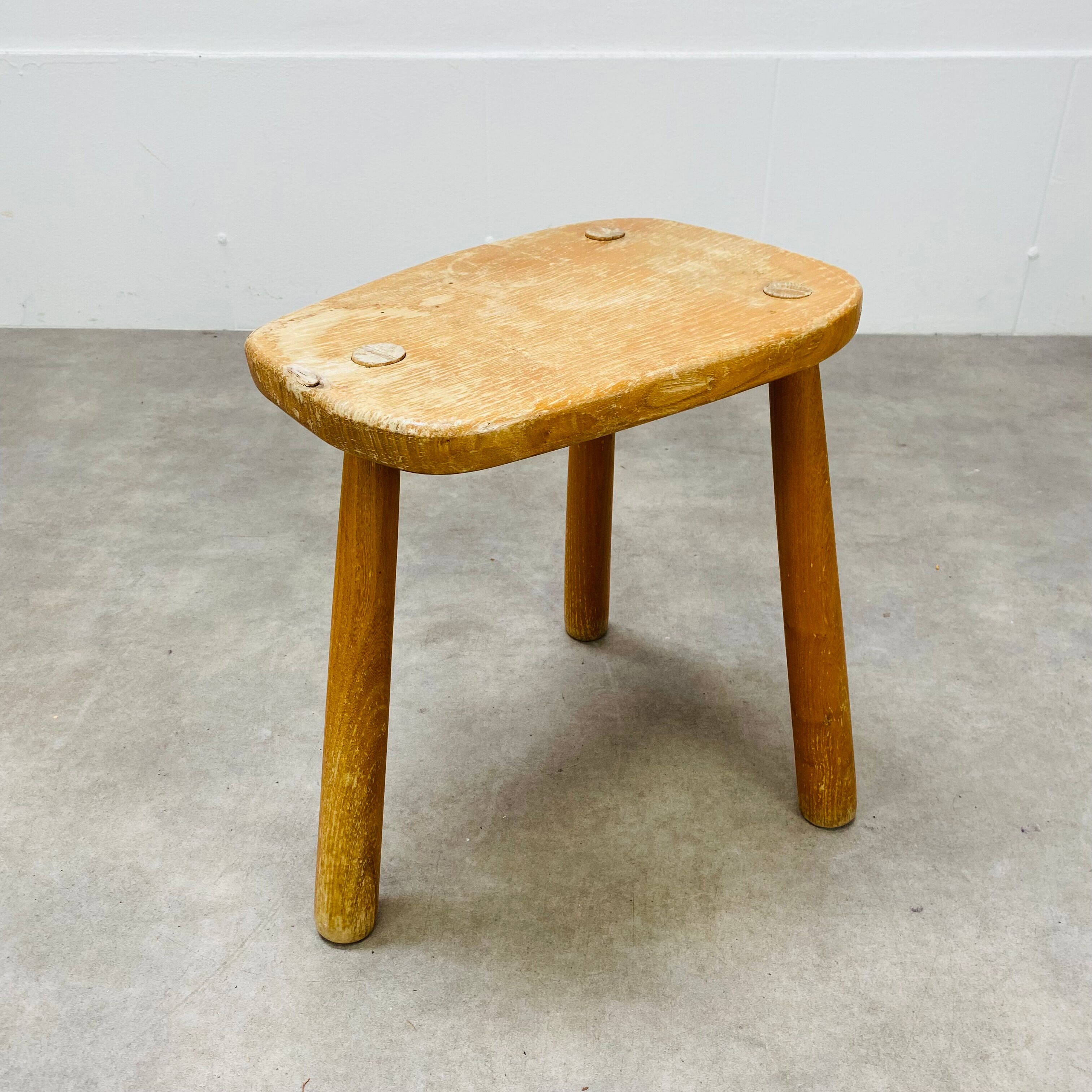 Brutalist solid wood tripod stool