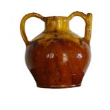 Pichet ou orjol ancien en faïence française à glaçure jaune