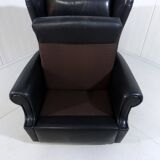 Black leather wingback chair on wheels 1960’s