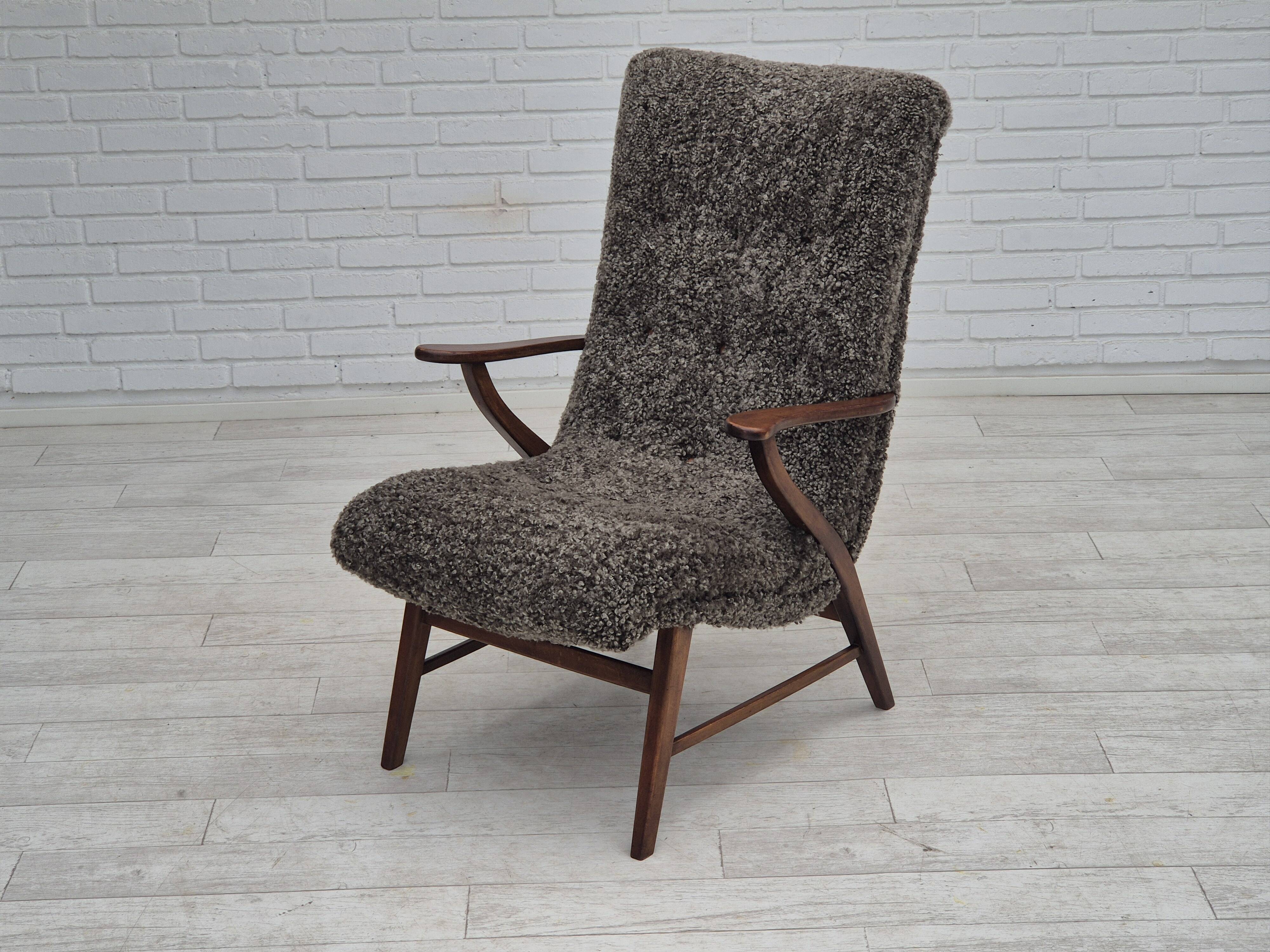60s, Danish design, refurbished armchair, genuine sheepskin "Wellington".