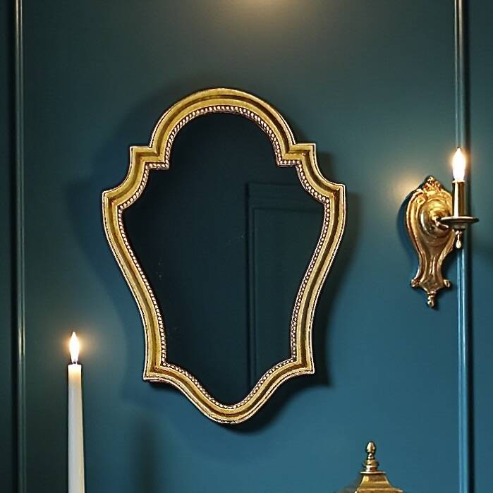 Antique mirror in gilded resin, shaped with curves – neoclassical style