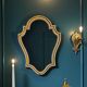 Antique mirror in gilded resin, shaped with curves – neoclassical style