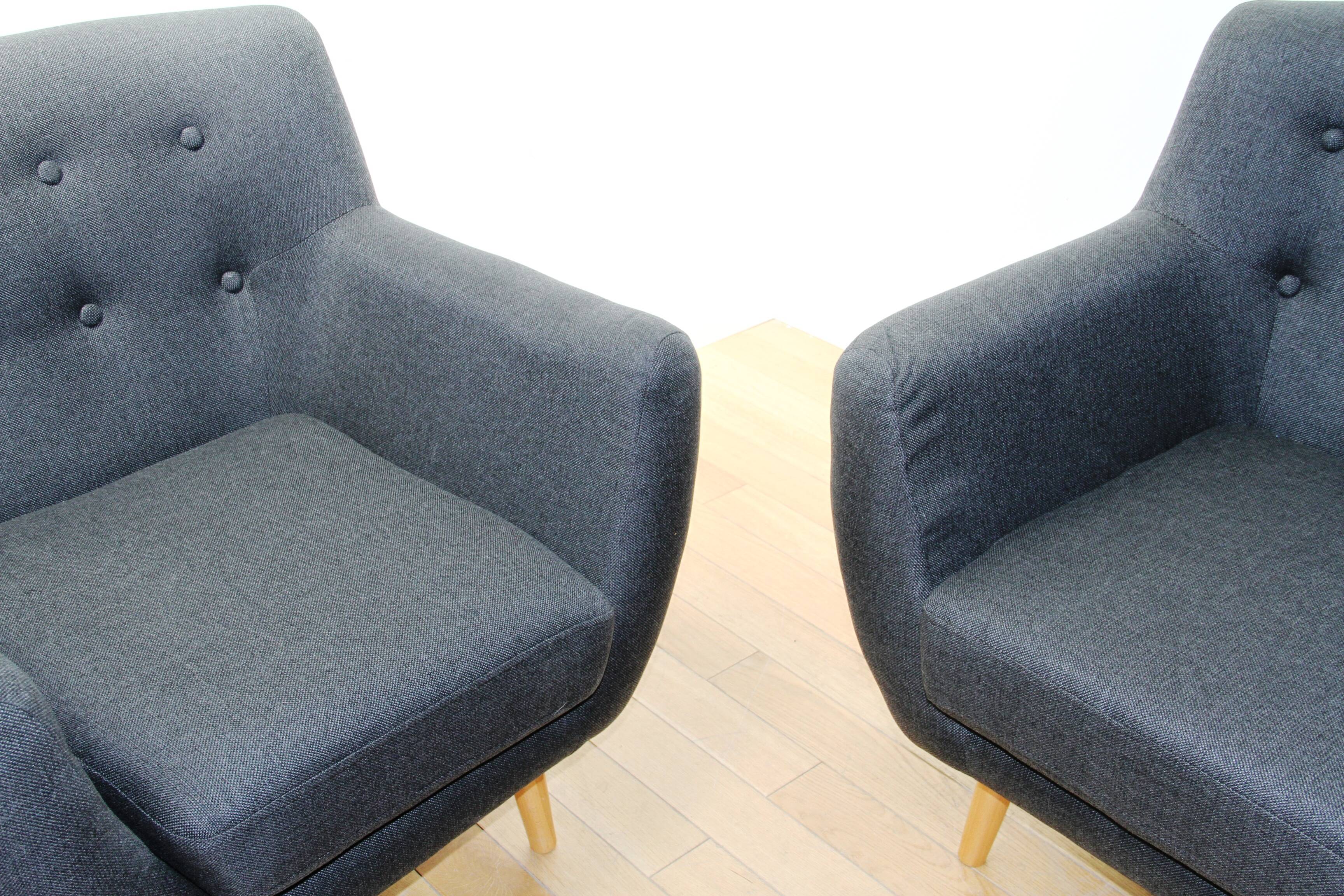 Pair of designer armchairs