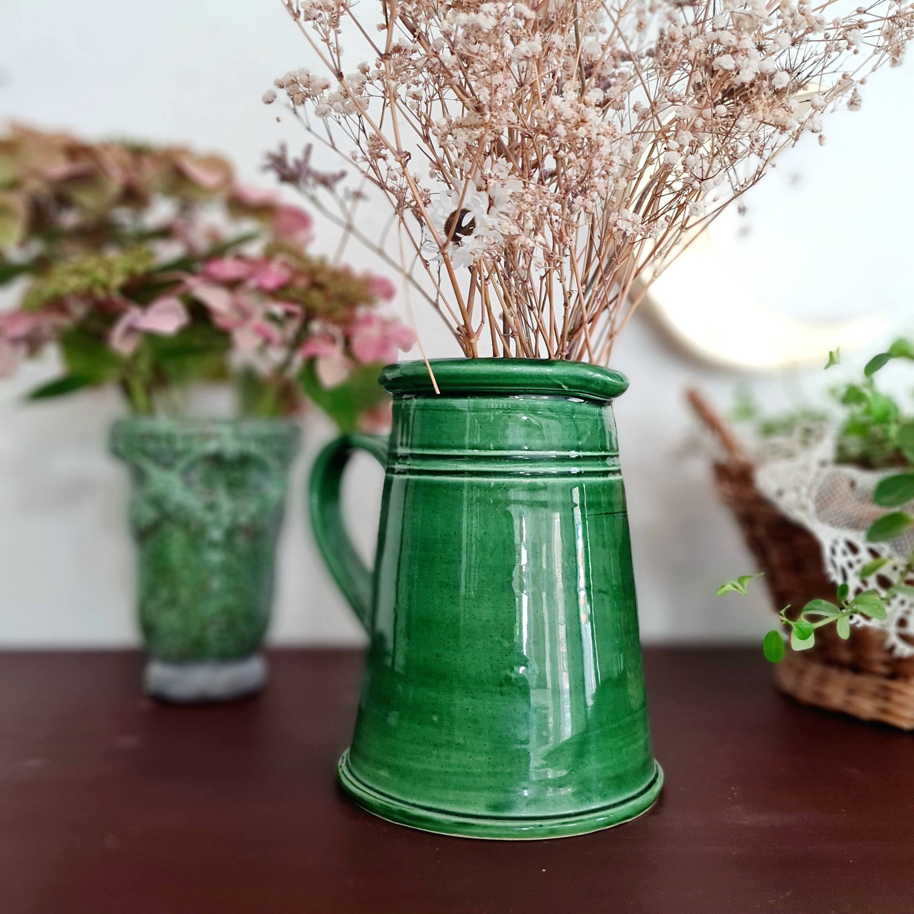 Green glazed terracotta pitcher