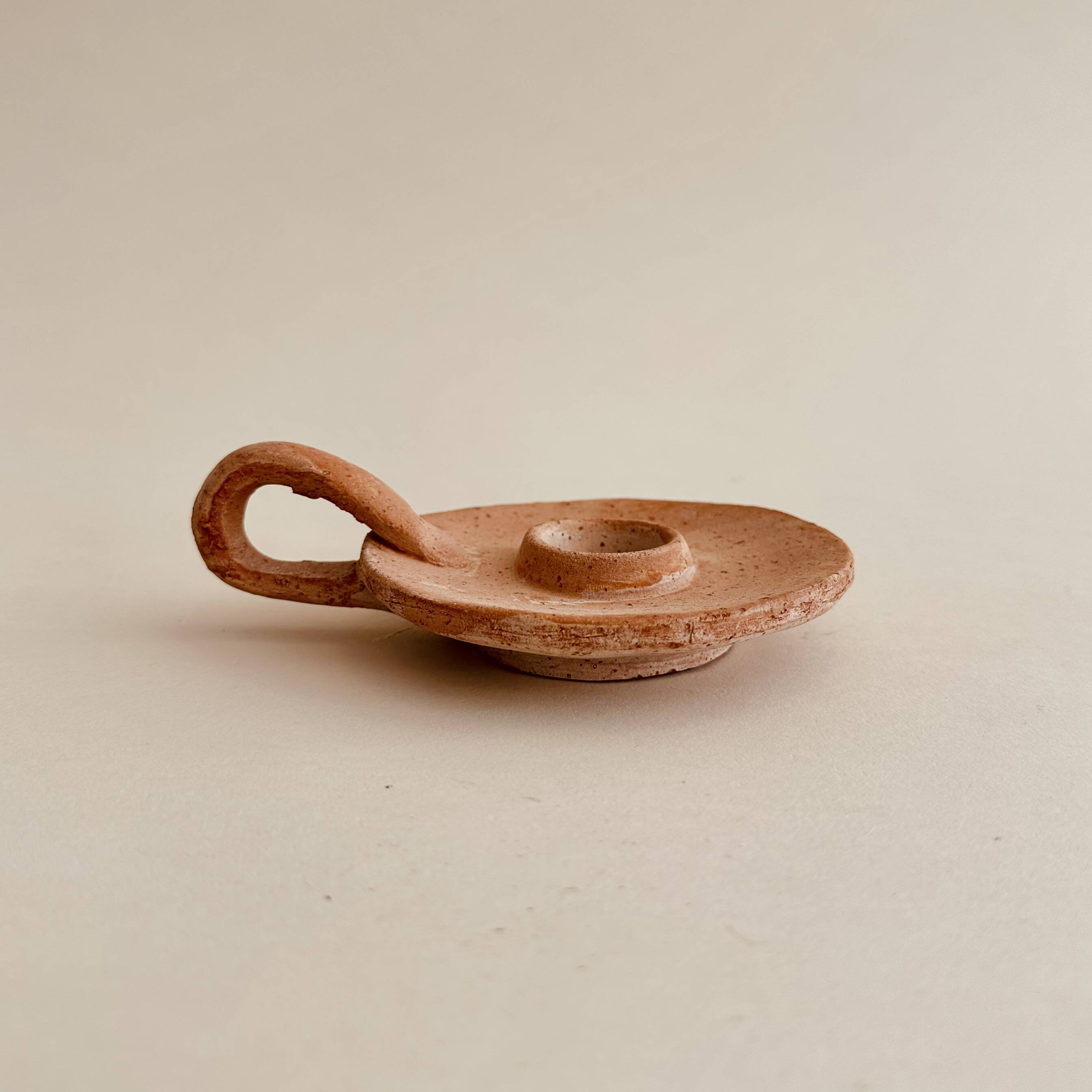 Terracotta candle holder