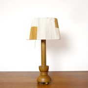 Wooden candle holder mounted as a lamp and its rope shade, 47.5cm.