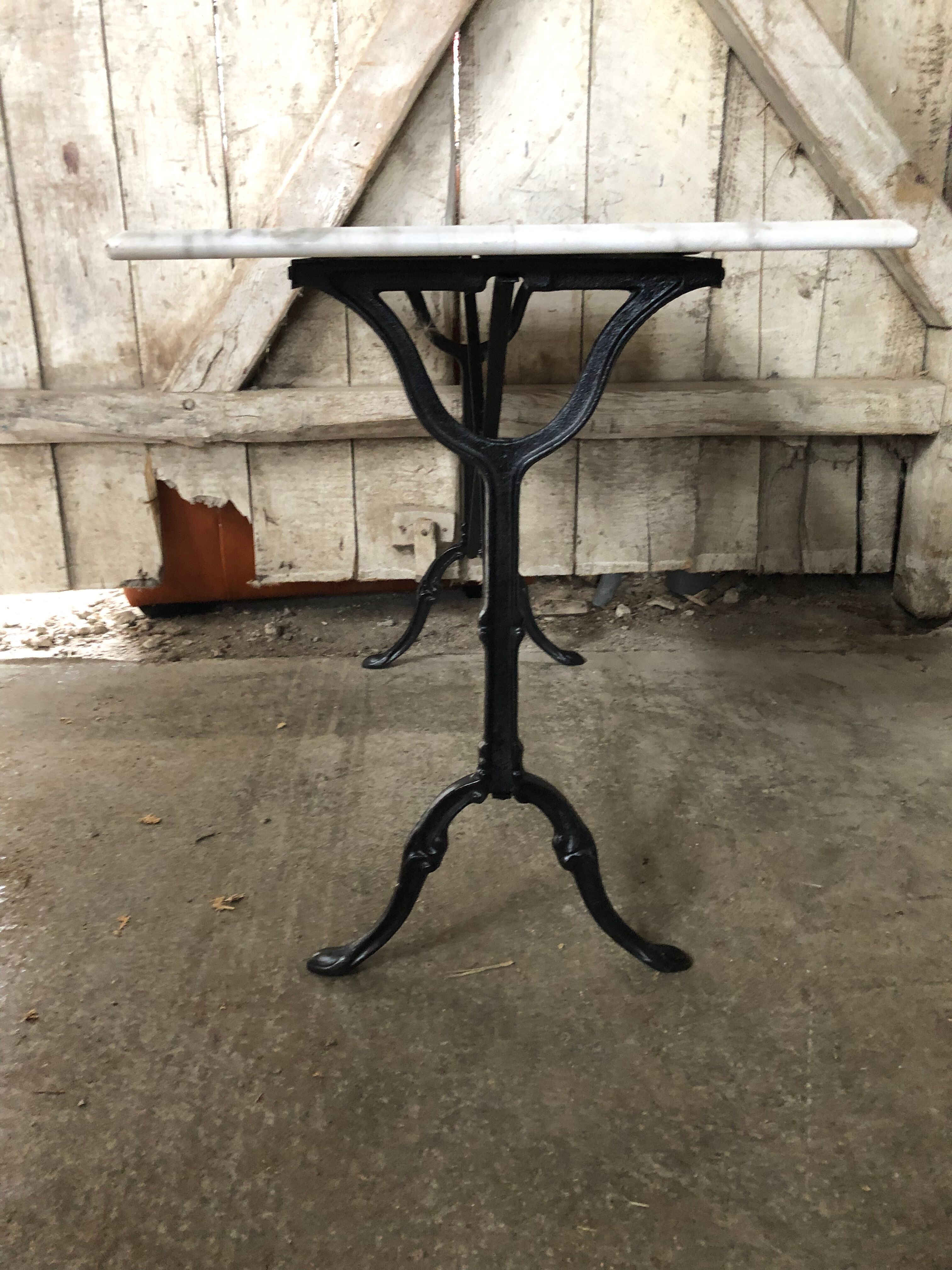 Old bistro table pied fer wrought black + white marble top vintage