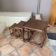 Lot de 3 tables gigognes en Rotin. 1960.