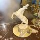 White rearing horse statuette