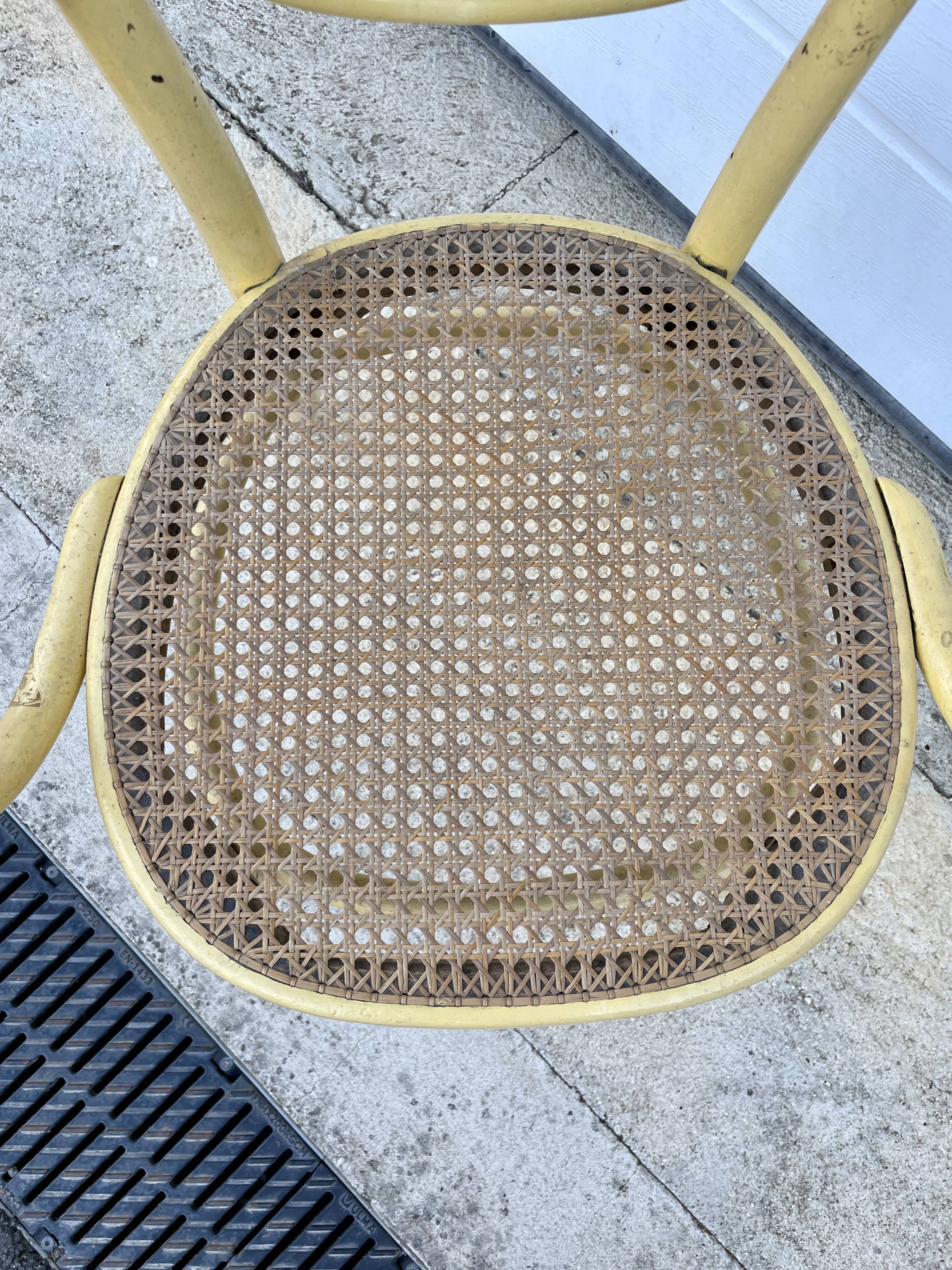 Old armchair Thonet canned wood