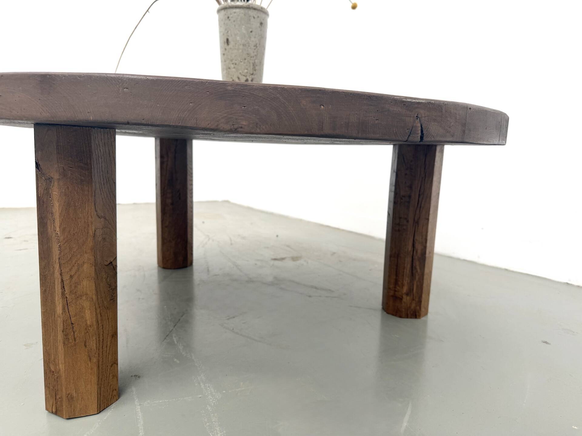 Round coffee table in solid oak, octagonal legs, France, 1950s.
