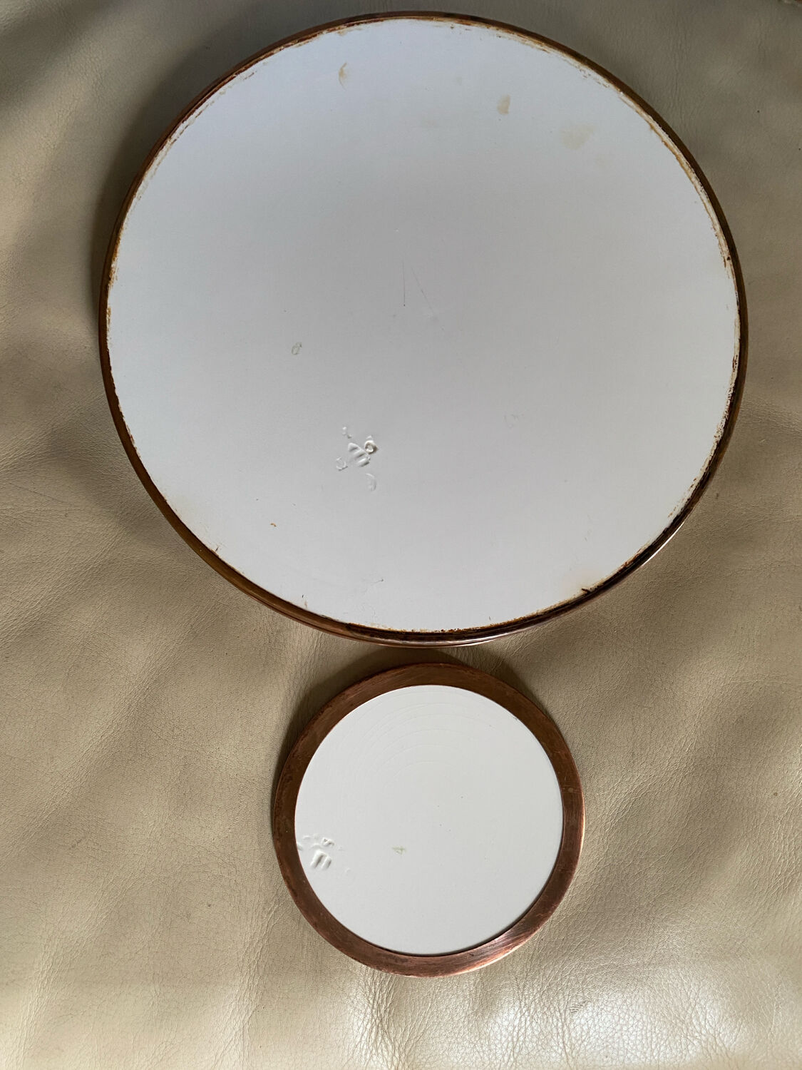 Ancient ceramic platter and bottle coaster