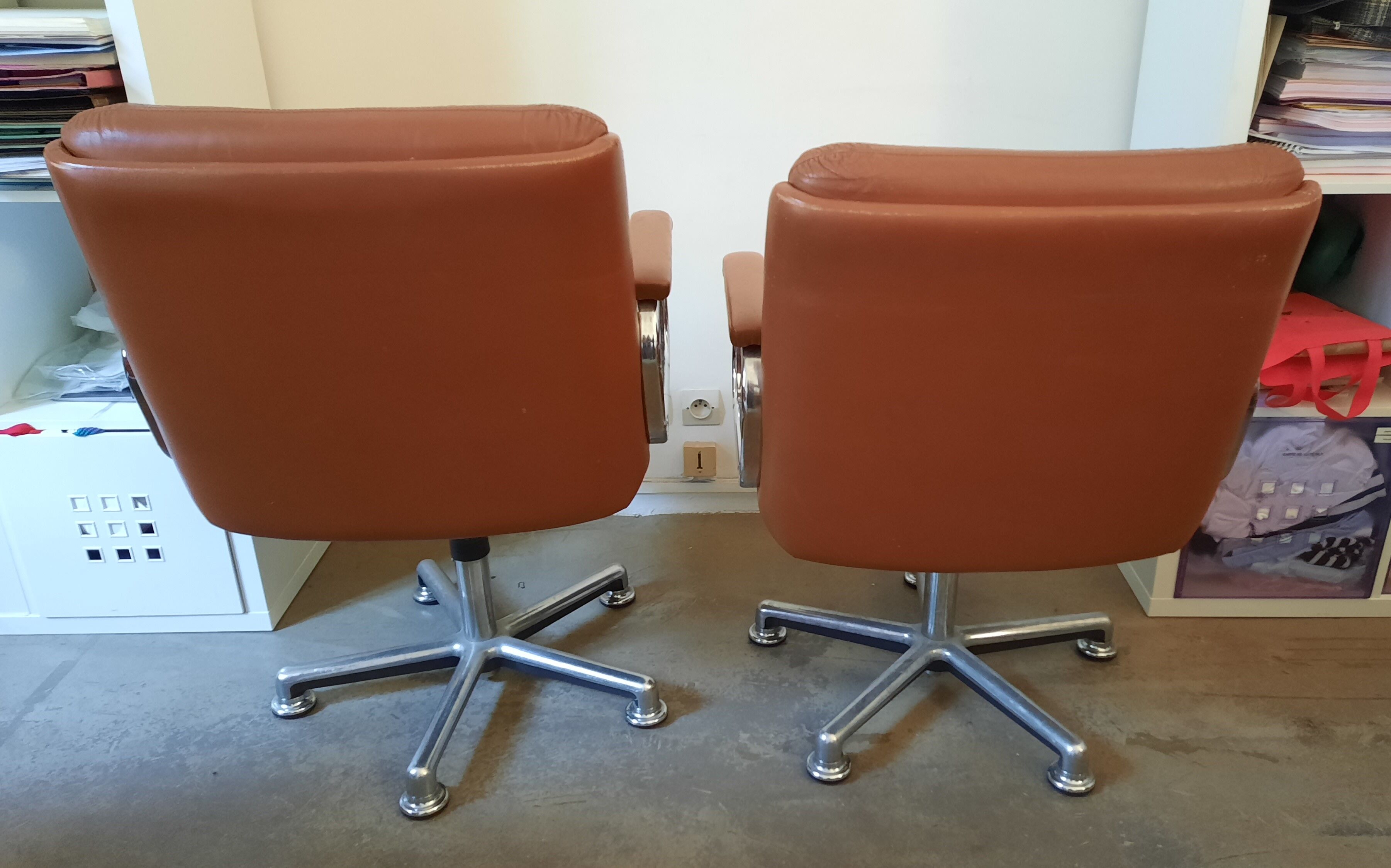 Brown leather armchairs