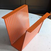 Vintage metal magazine rack in perforated orange/Mathieu Mategot style/70s