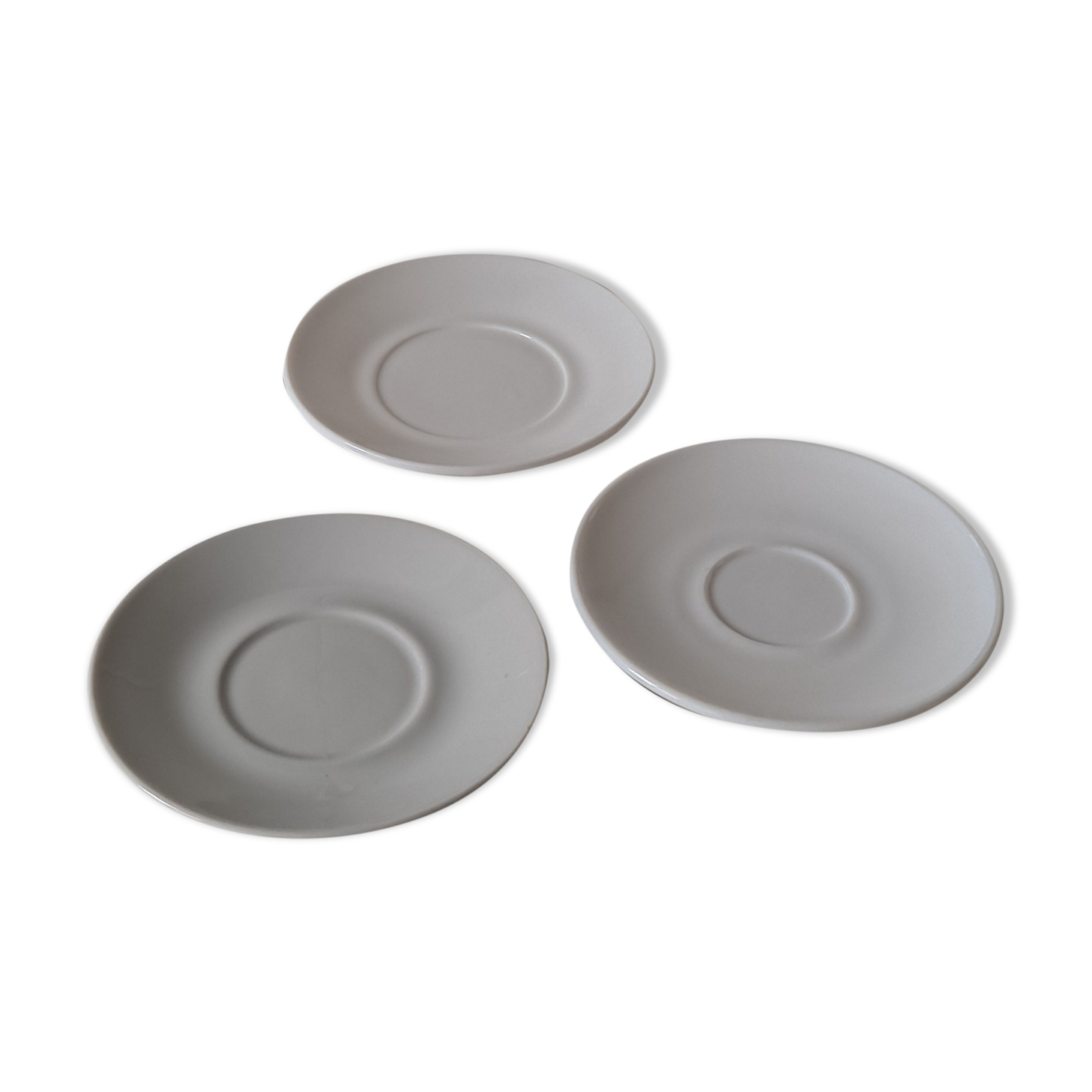 Trio of mismatched white cups