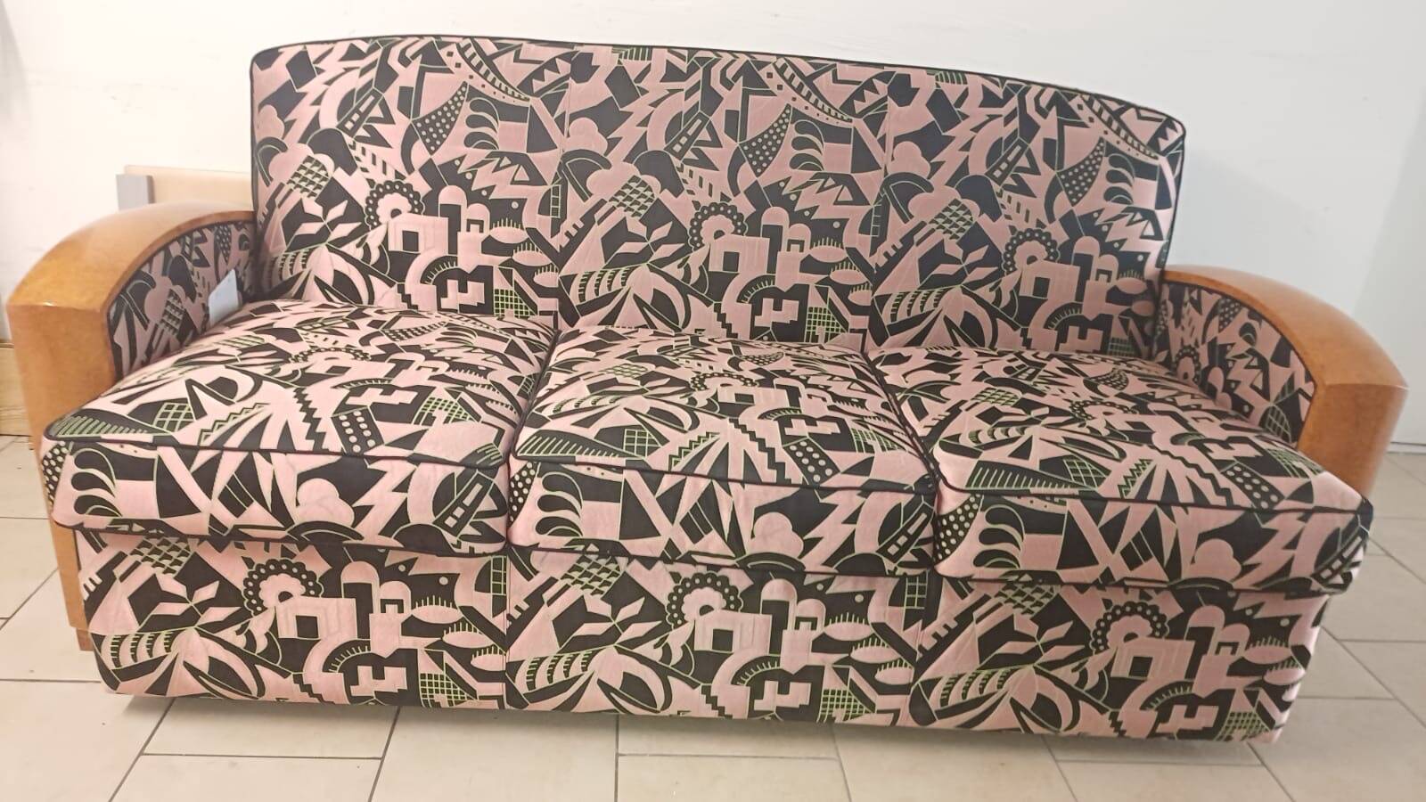 Convertible sofa and art deco armchair in lelievre fabrics.