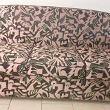 Convertible sofa and art deco armchair in lelievre fabrics.