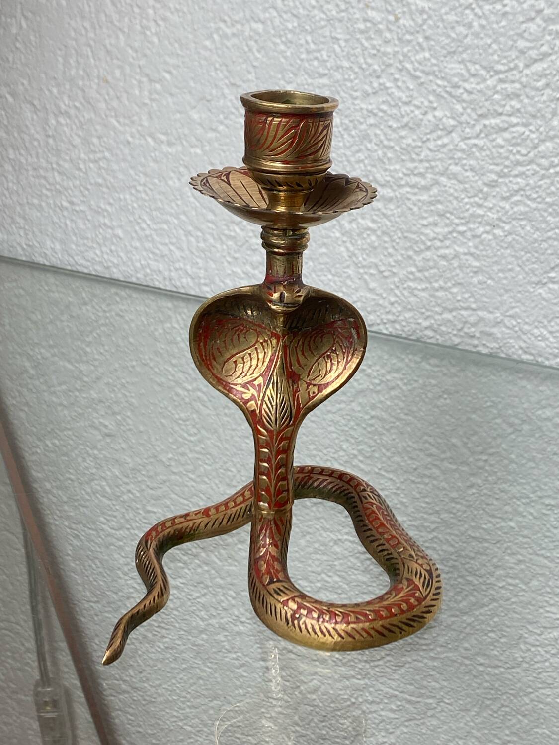 Chiseled brass cobra candlestick