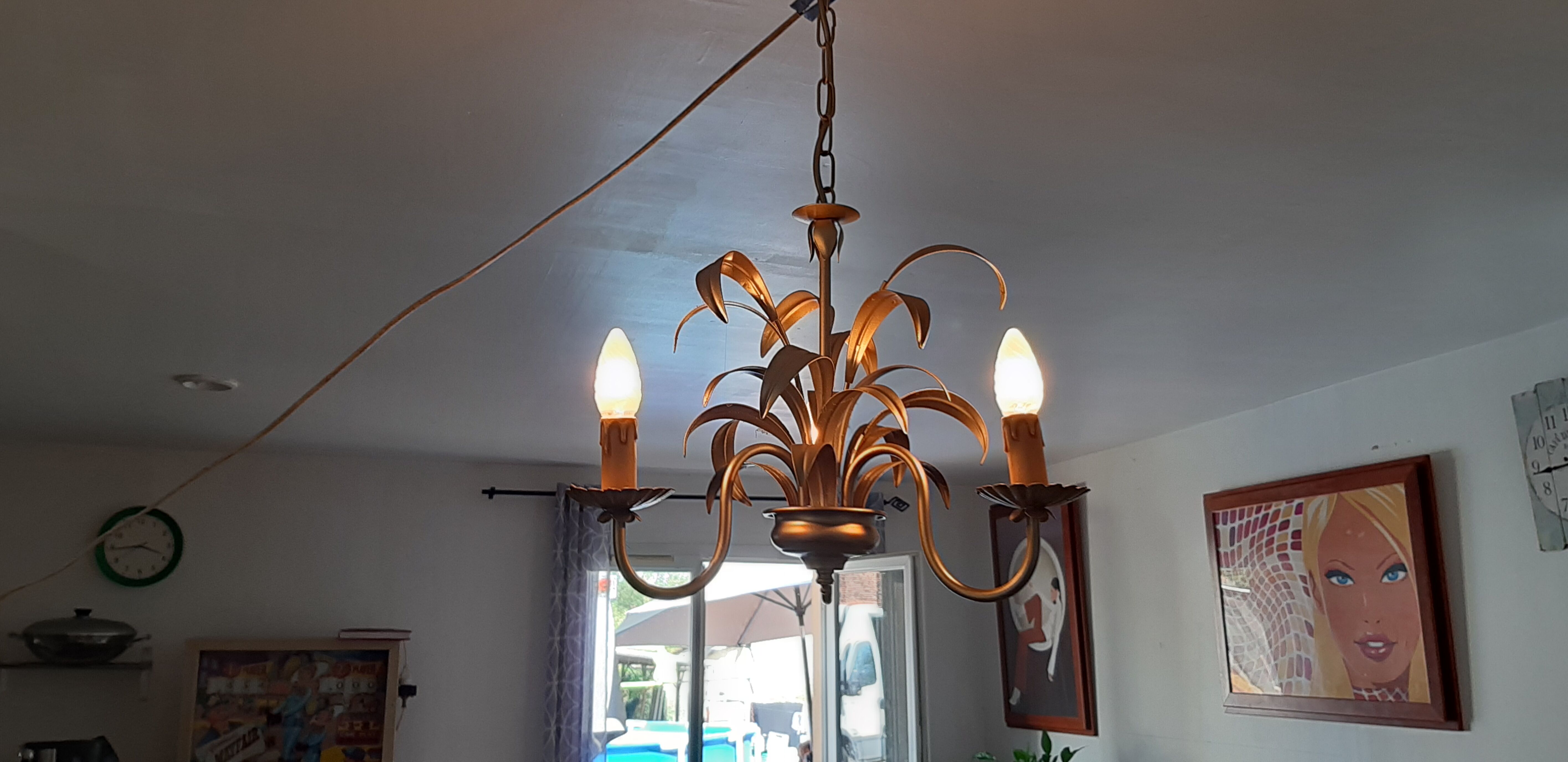 Vintage chandelier in golden metal