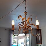 Vintage chandelier in golden metal