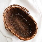 Oval basket with movable handle