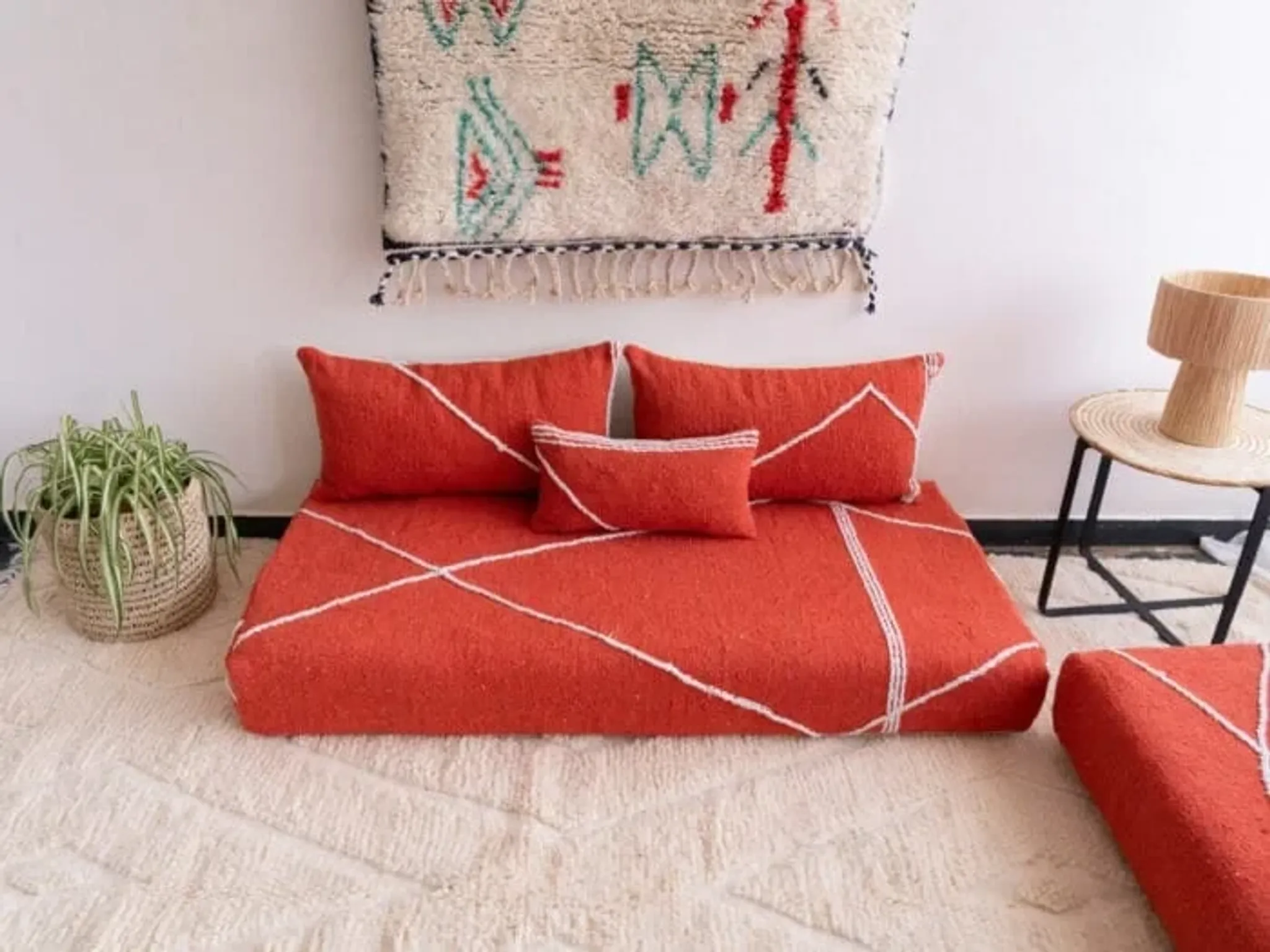 Handmade Moroccan floor cushion in orange cotton.