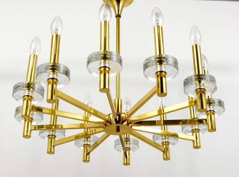 Brass and glass disc pendant light in the style of Gaetano Sciolari, mid-century, Italy, 1970s.