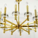 Brass and glass disc pendant light in the style of Gaetano Sciolari, mid-century, Italy, 1970s.
