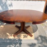 round table with central leg and extension, Baumann design