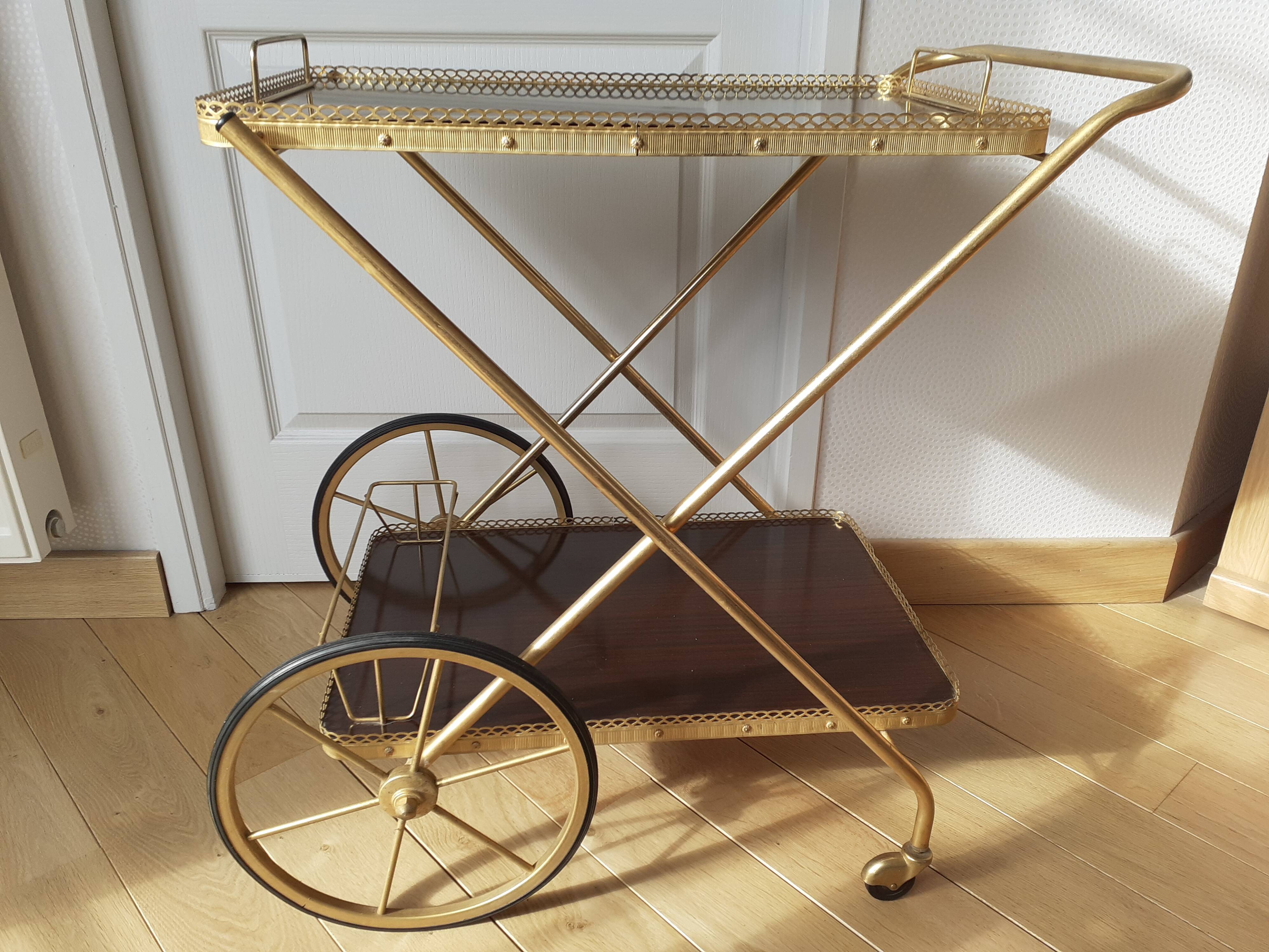 Rolling service in formica and gilded metal
